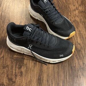 On Running woman’s Black Athletic Shoes